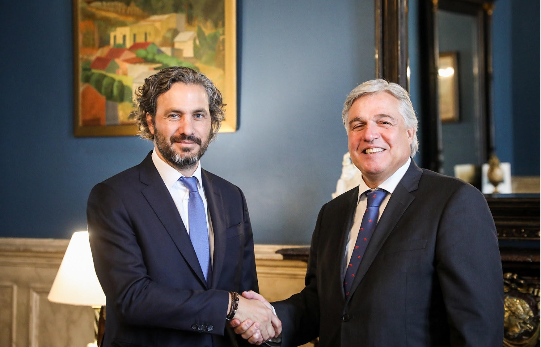 Cafiero y Bustillo acordaron cumbre presidencial en abril